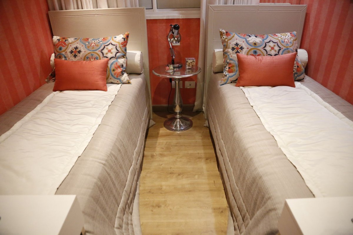 Two separate beds in a cozy bedroom — sleep divorce while keeping closeness as a couple